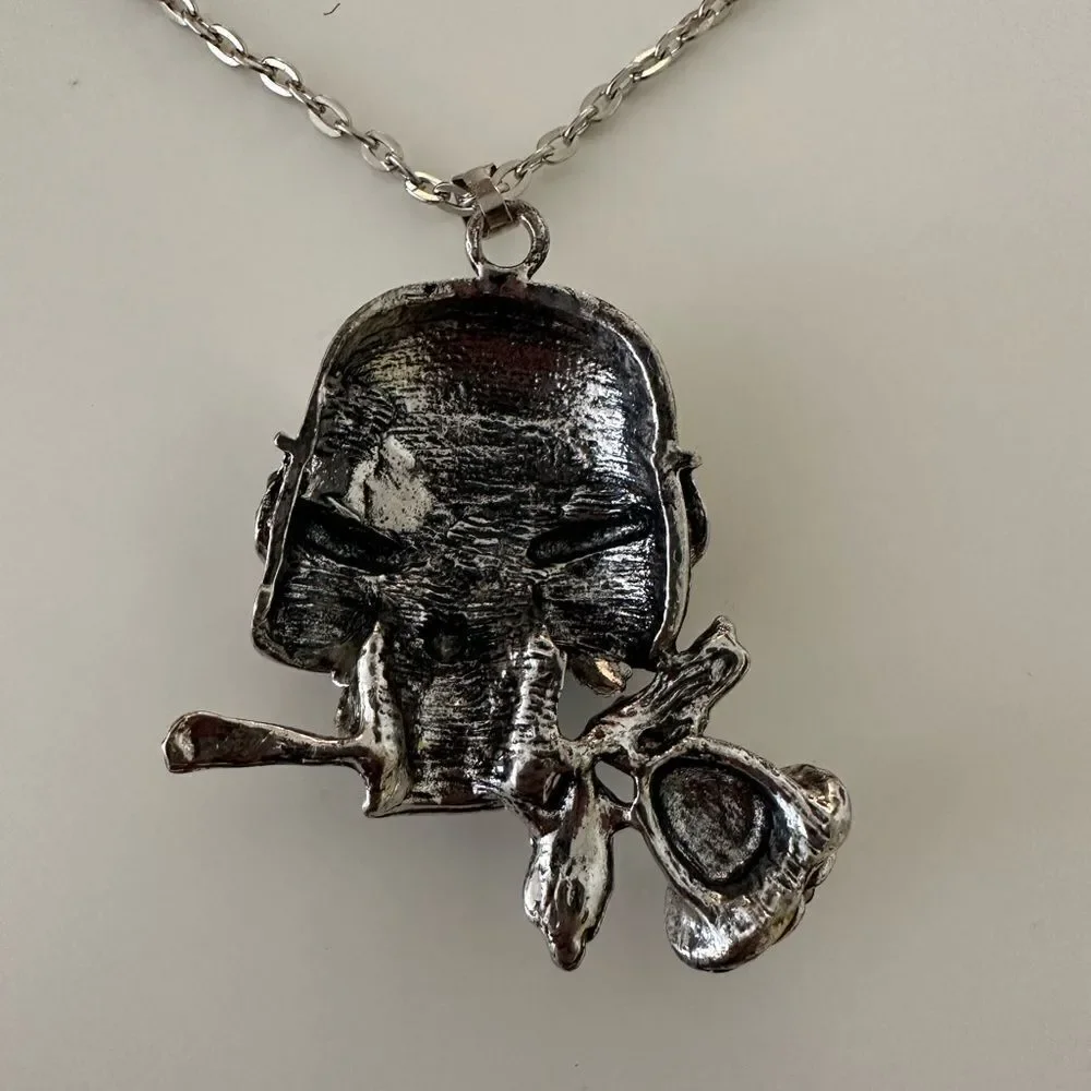 Vintage silver skull with black rhinestones and rose
